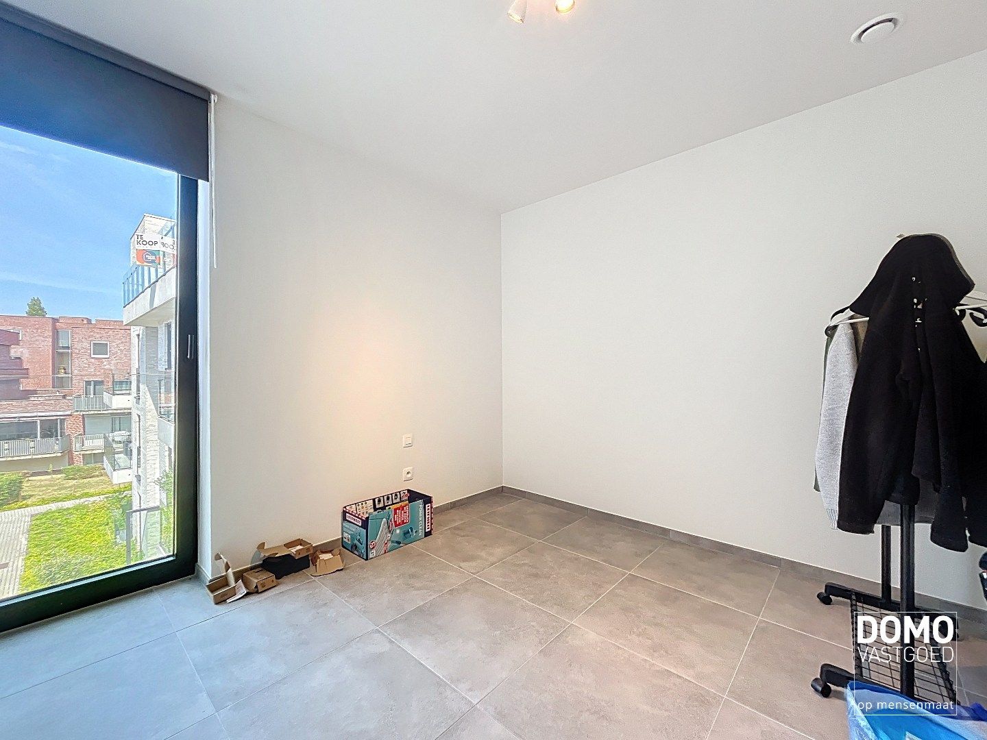 NIEUWBOUWAPPARTEMENT MET 2 SLAAPKAMERS, RUIM TERRAS, ONDERGRONDSE AUTOSTANDPLAATS EN KELDERBERGING IN MAASMECHELEN foto 7
