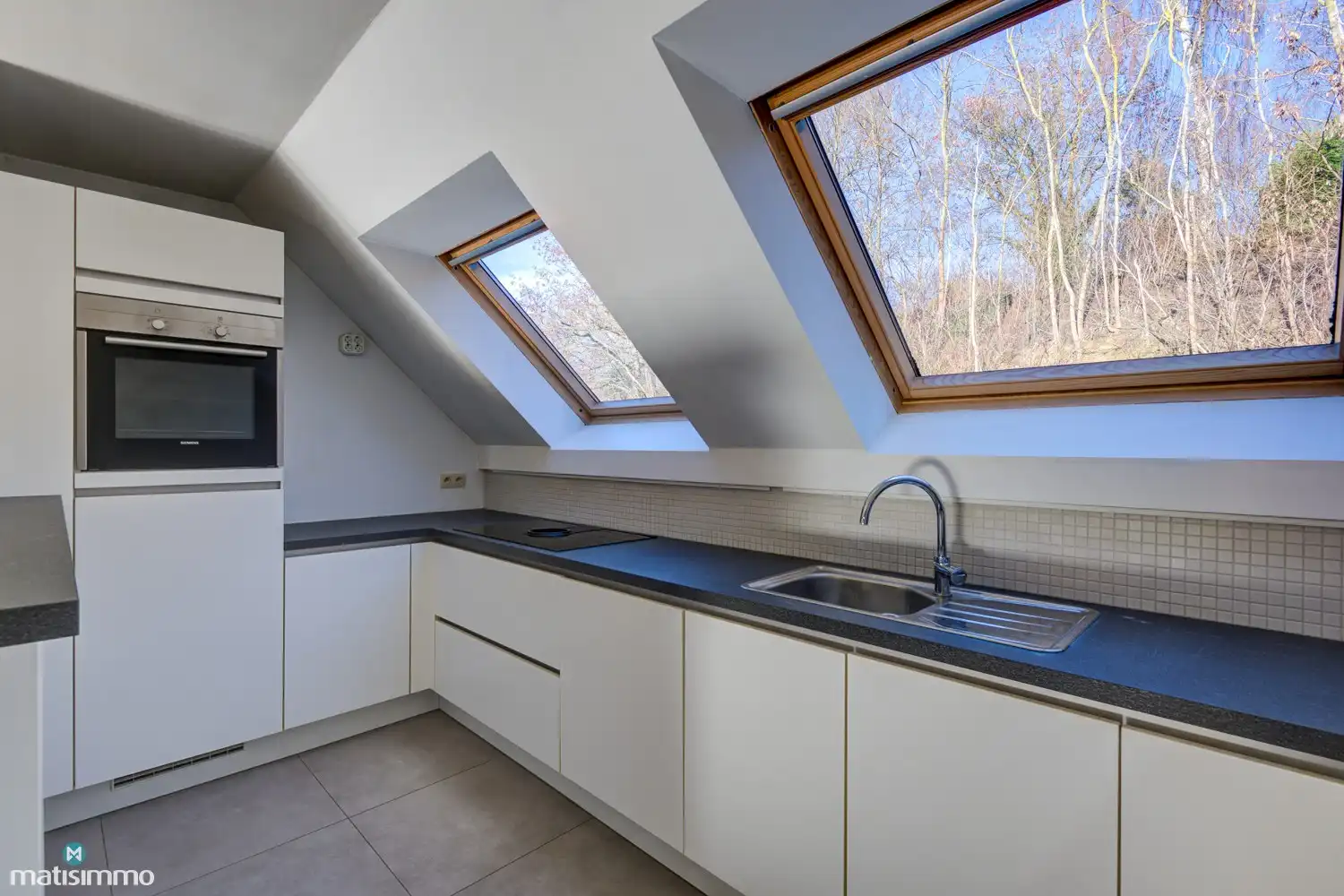 DUPLEXAPPARTEMENT MET 3 SLAAPKAMERS, TERRAS EN ONDERGRONDSE AUTOSTAANPLAATS NABIJ HET CENTRUM VAN BILZEN foto 6