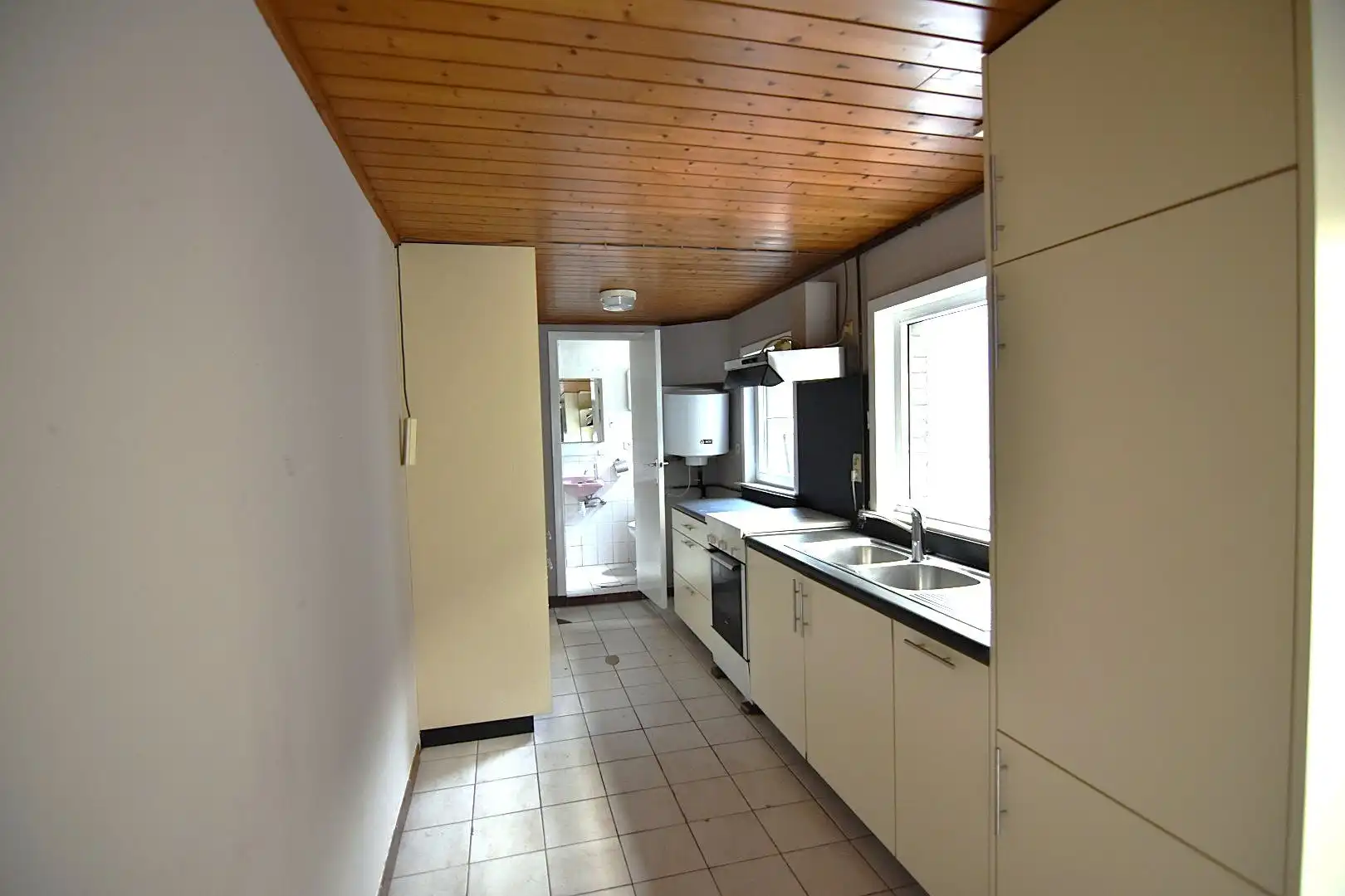 Te renoveren rijwoning met goeie ligging foto 8