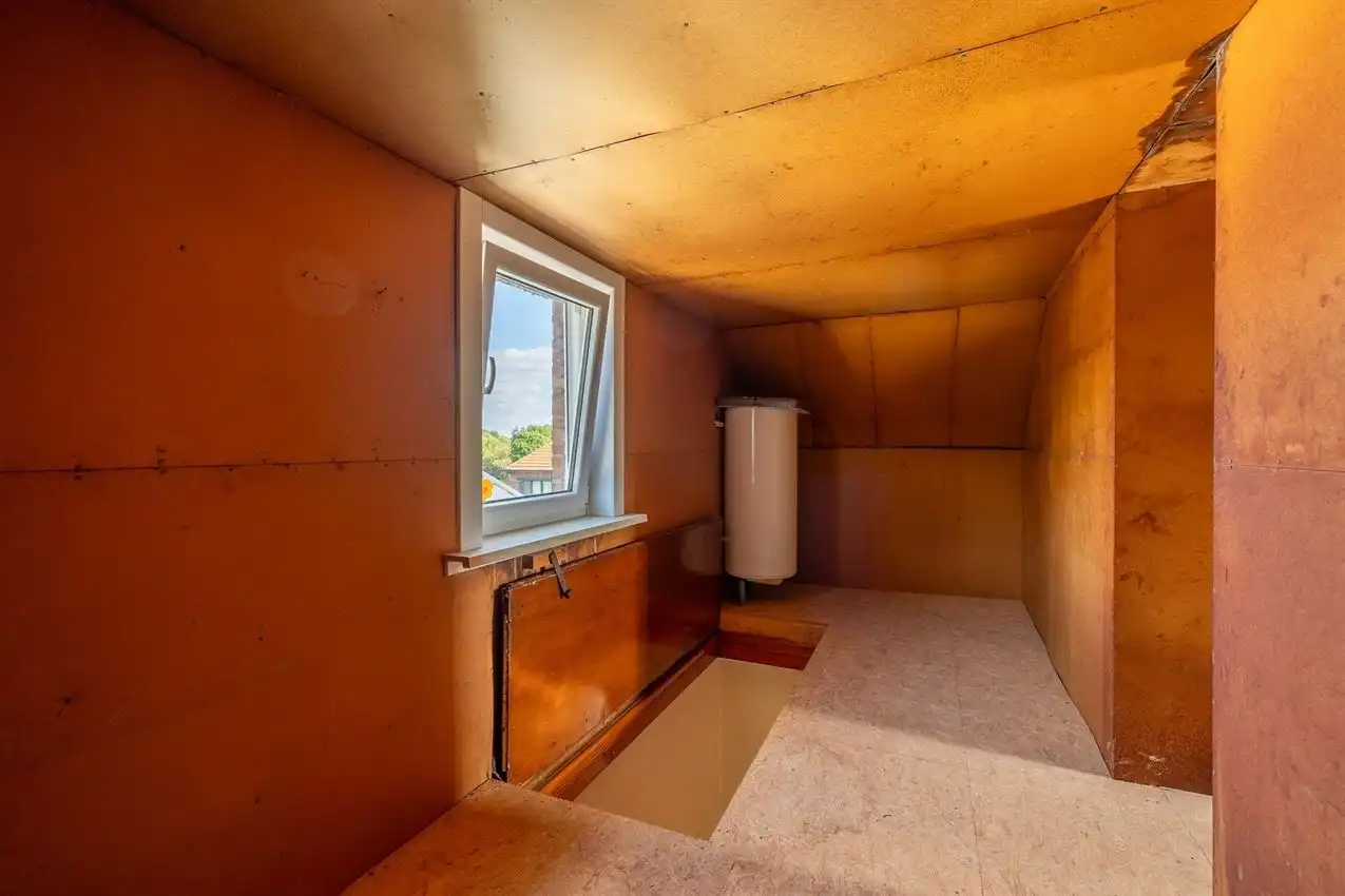 Karaktervolle woning met grote tuin, bijgebouwen en uitbreidbaar zoldervolume op een verrassend diep perceel foto 30