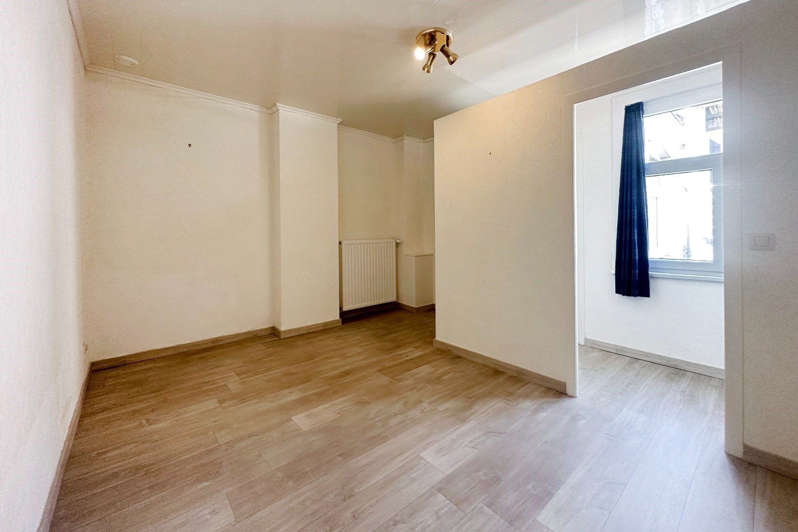 Prachtige interbellumwoning onderverdeeld in drie ruime appartementen foto 13