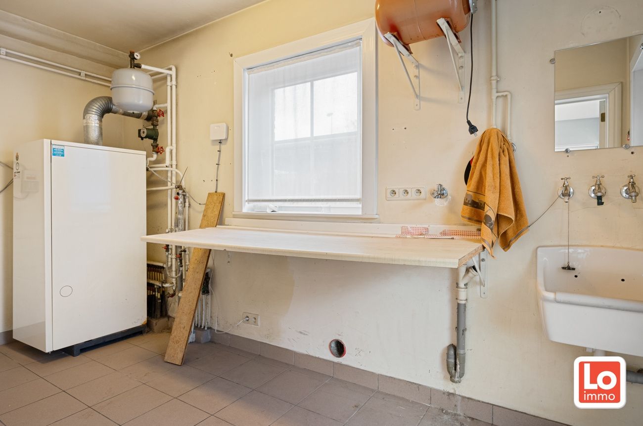 VERKOCHT!! Mooie en degelijke open bebouwing met inpandige garage op een heel rustige toplocatie vlakbij het centrum van Lochristi! foto 11