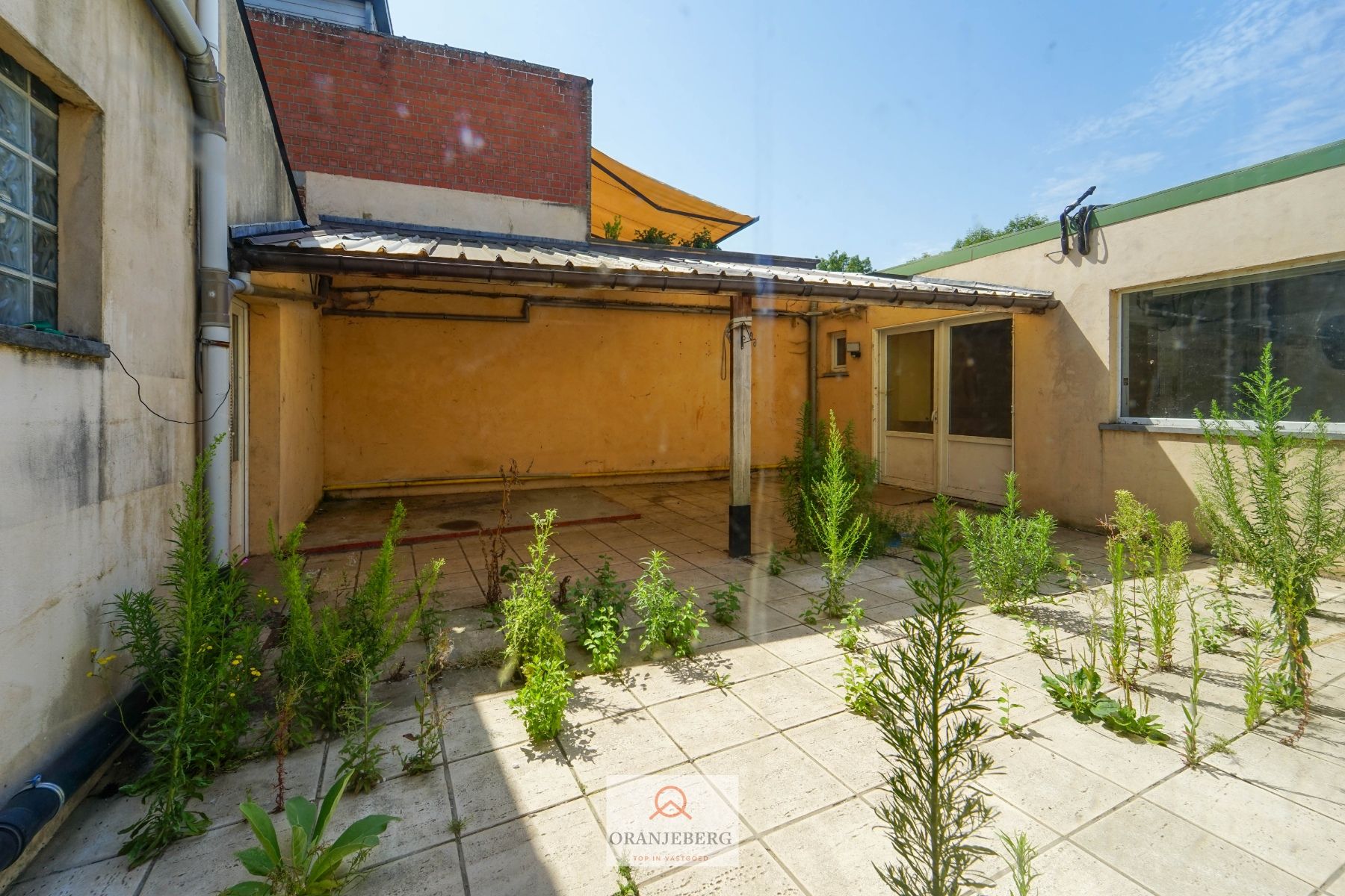 Ideaal te renoveren rijwoning + werkplaats + garage + tuin voor 591m² foto 11