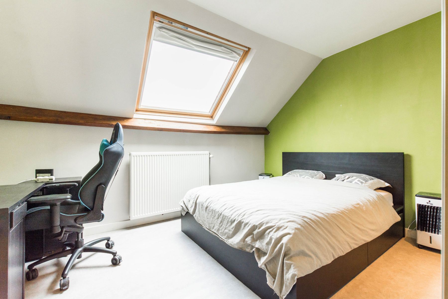 Instapklare rijwoning met 2 slaapkamers, zonneterras en tuin foto 13