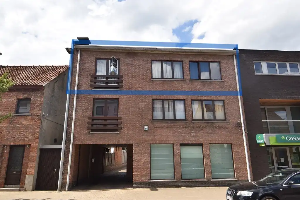Ruim en lichtrijk appartement met garage in het centrum van Nieuwkerken-Waas foto {{pictureIndex}}