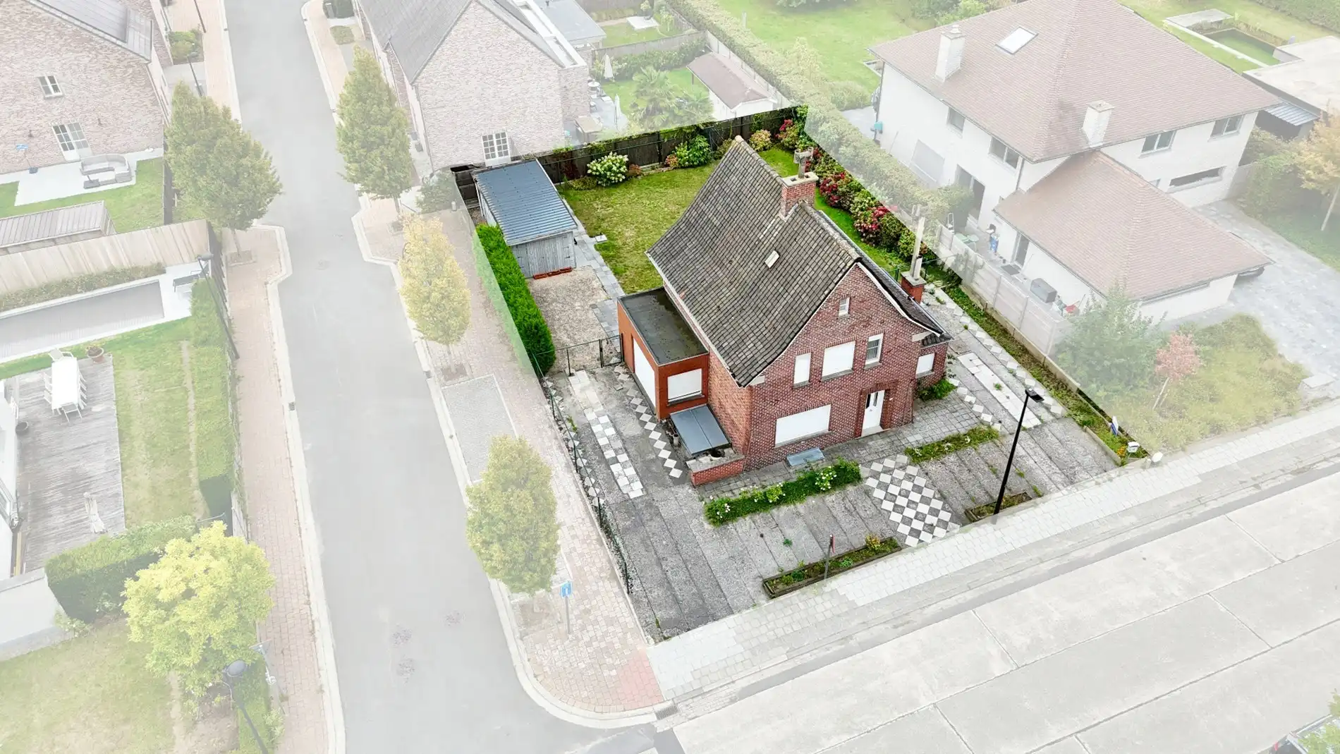 Hoofdfoto van de publicatie: Alleenstaande woning te koop in Kuurne met ruime tuin, 3 slaapkamers en een topligging. 