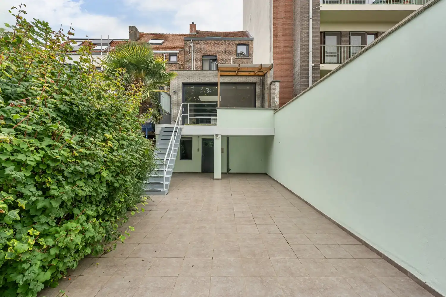 Gerenoveerde en energiezuinige woning met 4 slaapkamers en een tuin grenzend aan het Mariapark te Leuven! foto 11