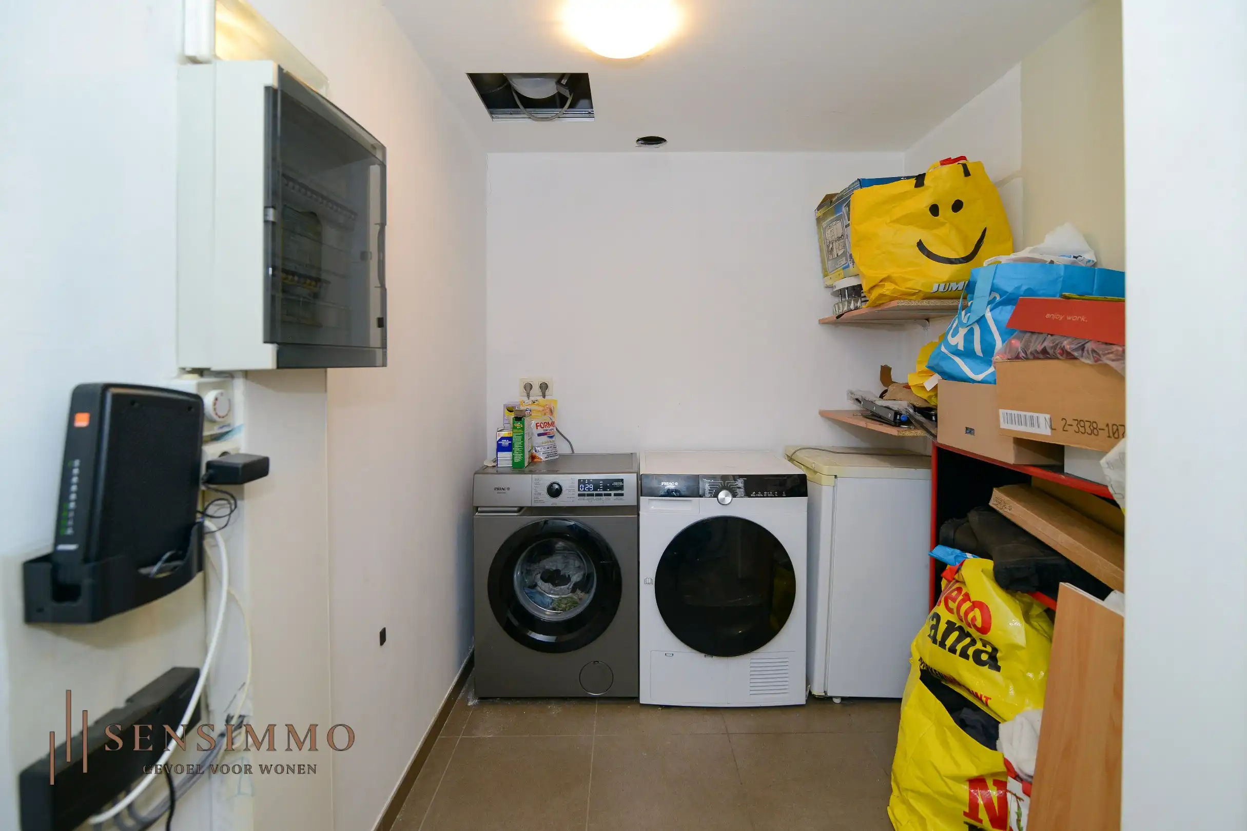 Instapklaar 2-slaapkamerappartement met dubbele terrassen en garagebox in hartje Eisden foto 16