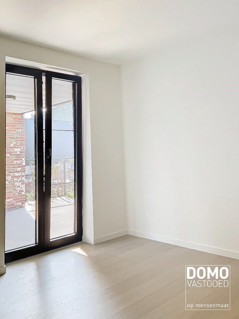 Energiezuinig gelijkvloers nieuwbouwappartement appartement met tuin ondergrondse autostandplaats - 108m² - EPC A foto 5