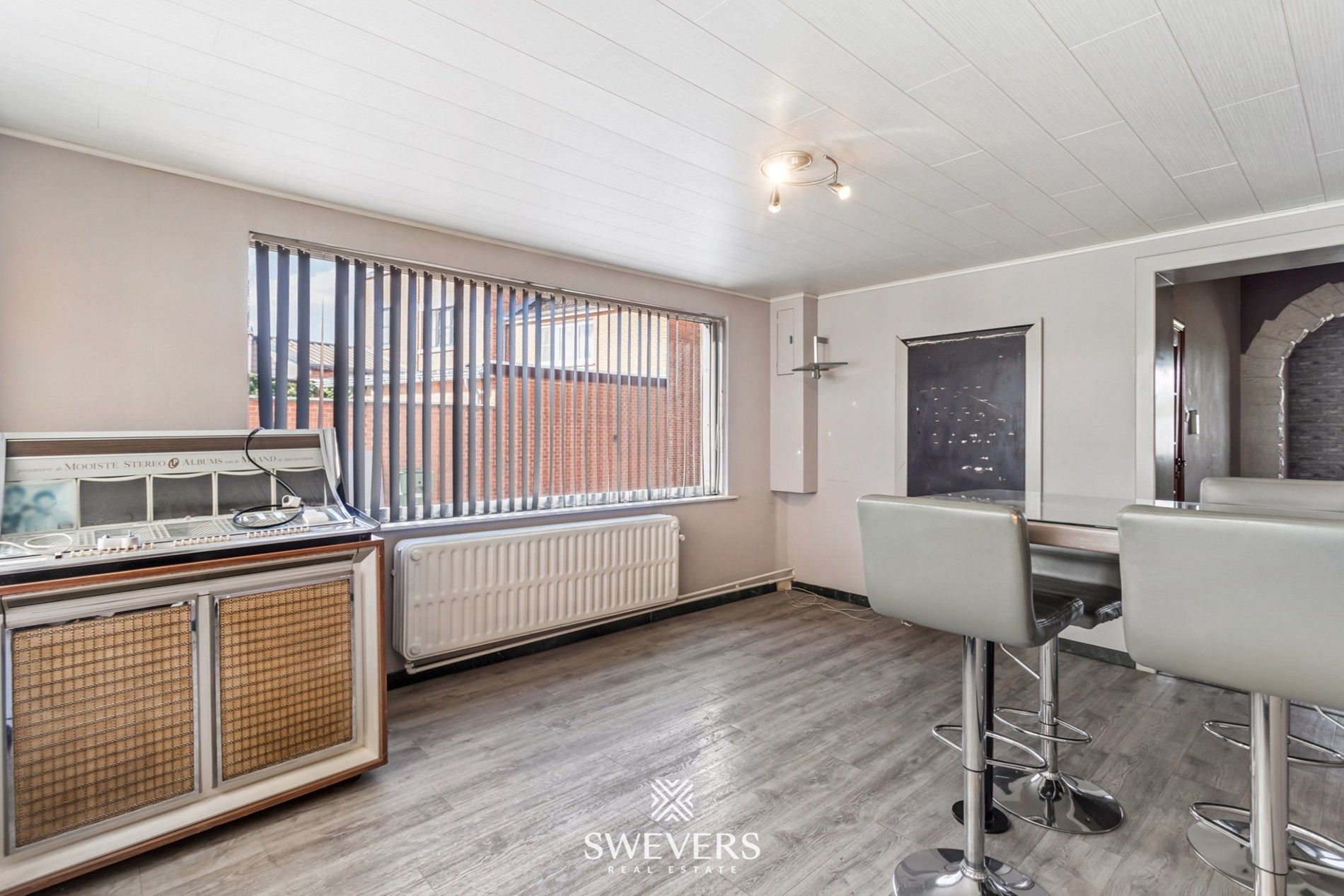 Ideale gezinswoning, instapklaar met ruime tuin en bouwgrond foto 12