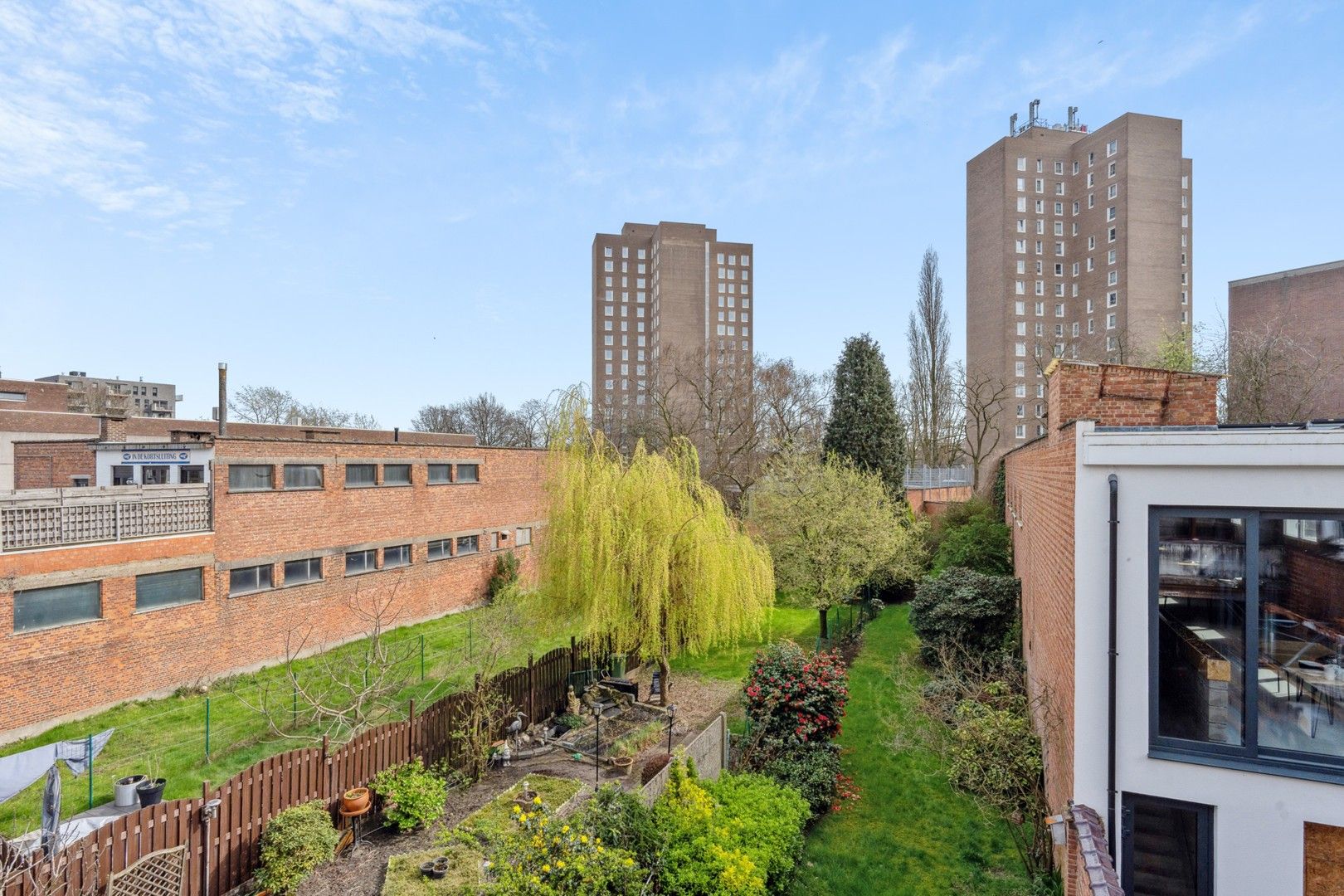 Opbrengsteigendom met tuin en 2 appartementen te koop foto 11