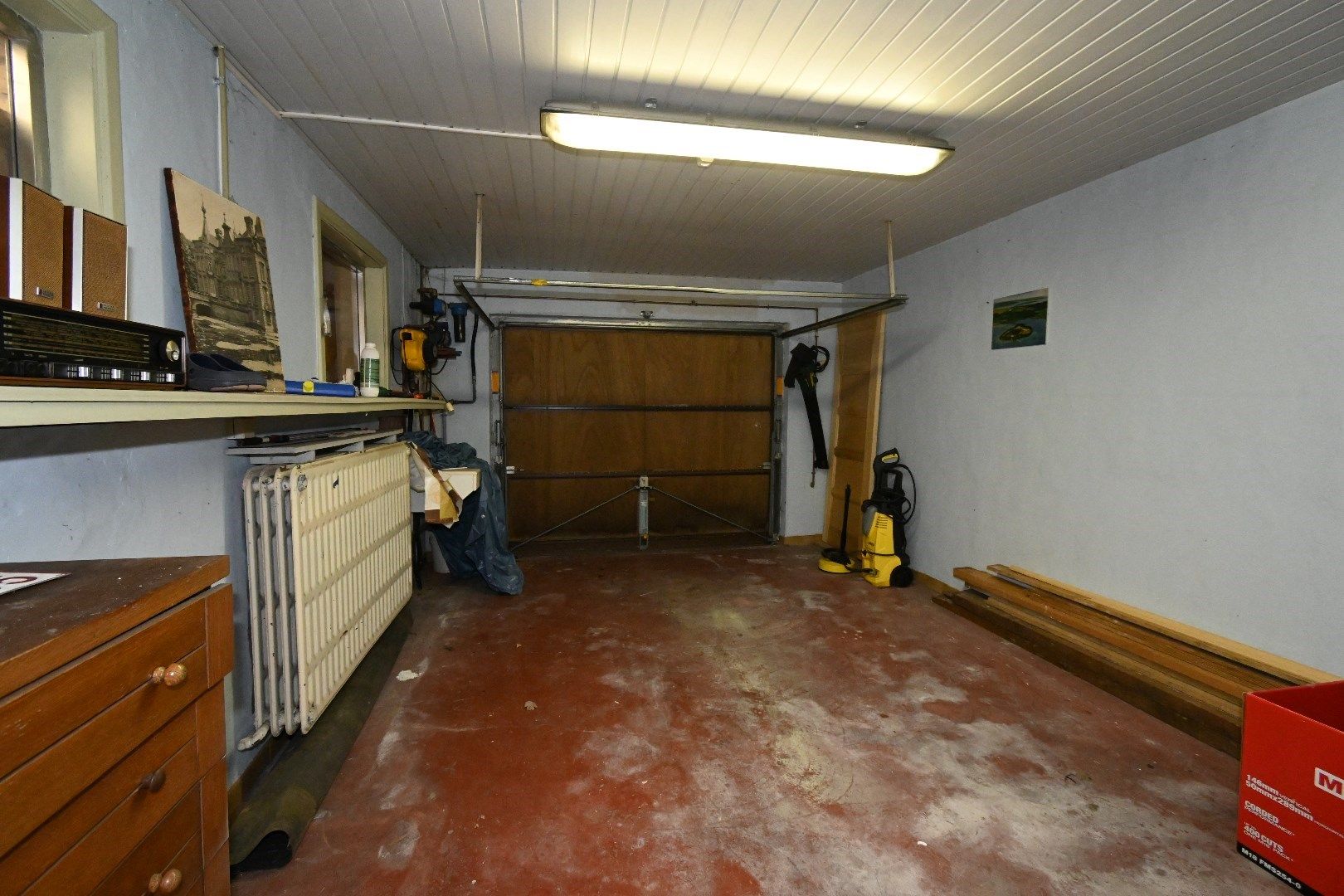 Halfopen bebouwing met garage en tuin foto 22