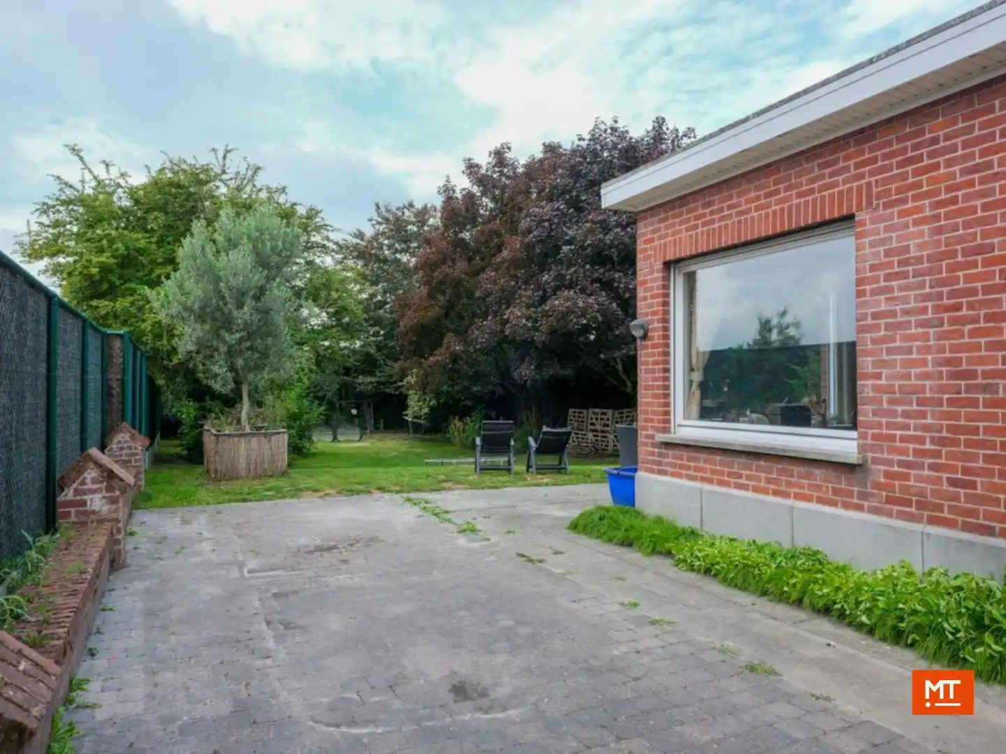 Alleenstaande woning met 3 slaapkamers (4 mogelijk), garage en tuin (ZW) te koop in Langemark foto 16