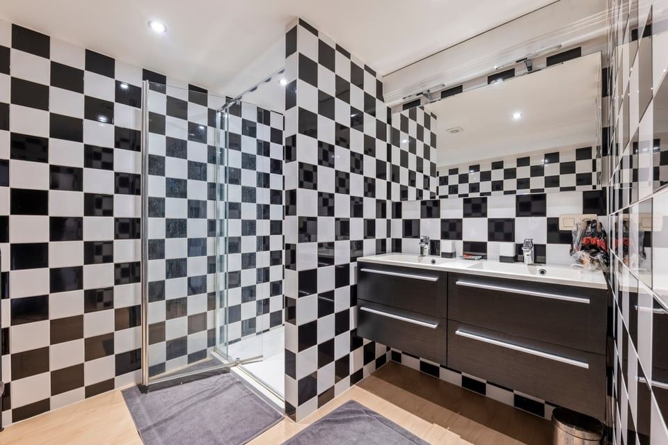 ICONISCH HANDELSPAND MET LUXUEUZE WOONST OP DE GROTE MARKT VAN SINT-TRUIDEN foto 22