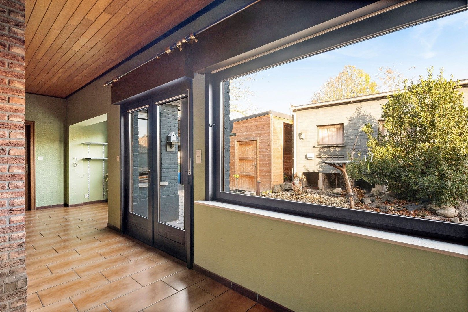 Vrijstaande woning in tweede lijn met 2 kamers op het gelijkvloers en voldoende stockageruimte en gesloten garage van 40m² foto 15