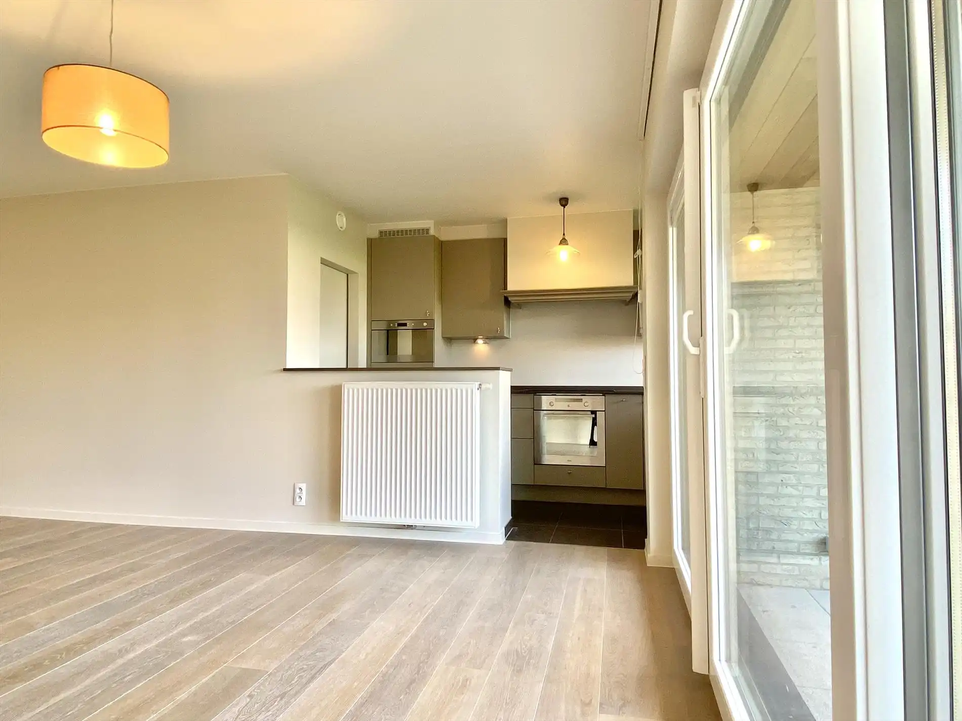 Ontdek dit prachtig gelijkvloers appartement met tuin en zicht op de Leie te Harelbeke! foto 3