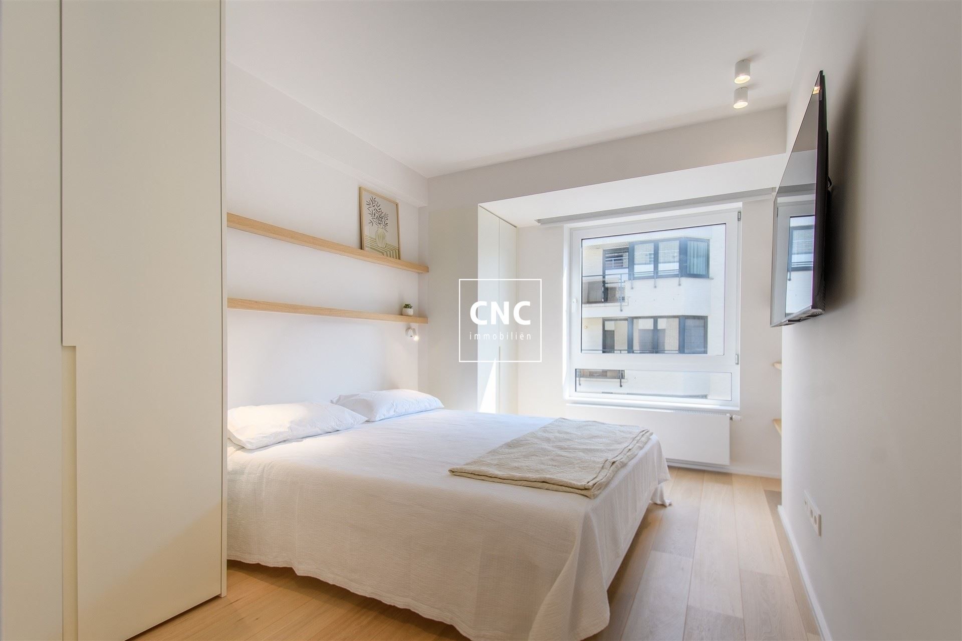 Stijlvol gerenoveerd en zonnig hoekappartement op topligging foto 11