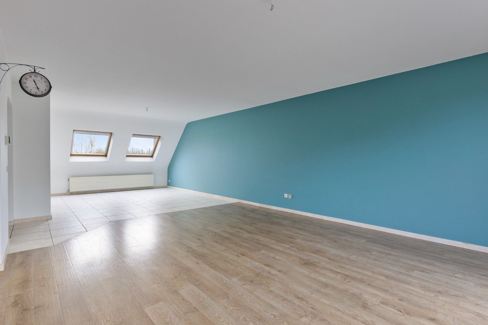 Riant dakappartement met terras en garage foto 4