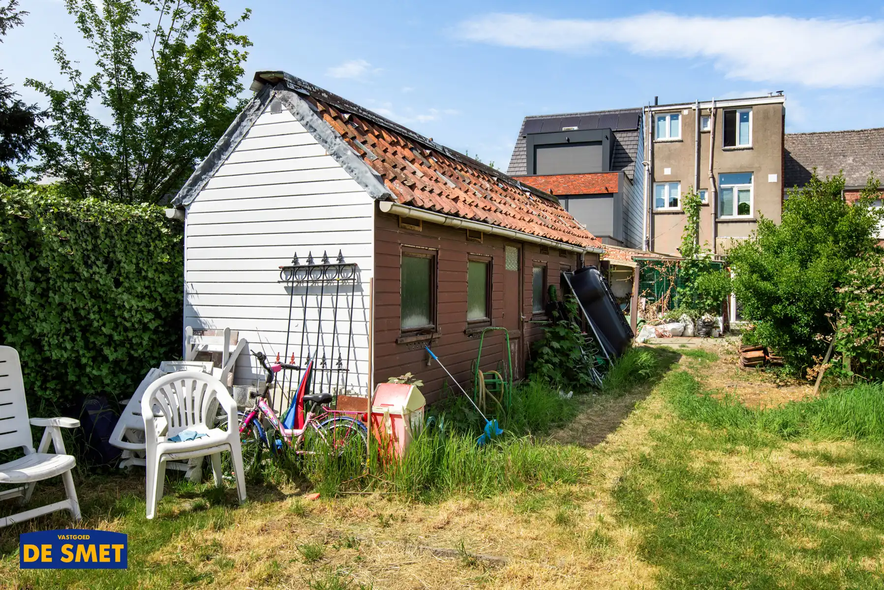 Polyvalente halfopen bebouwing met diepe tuin nabij centrum foto 11