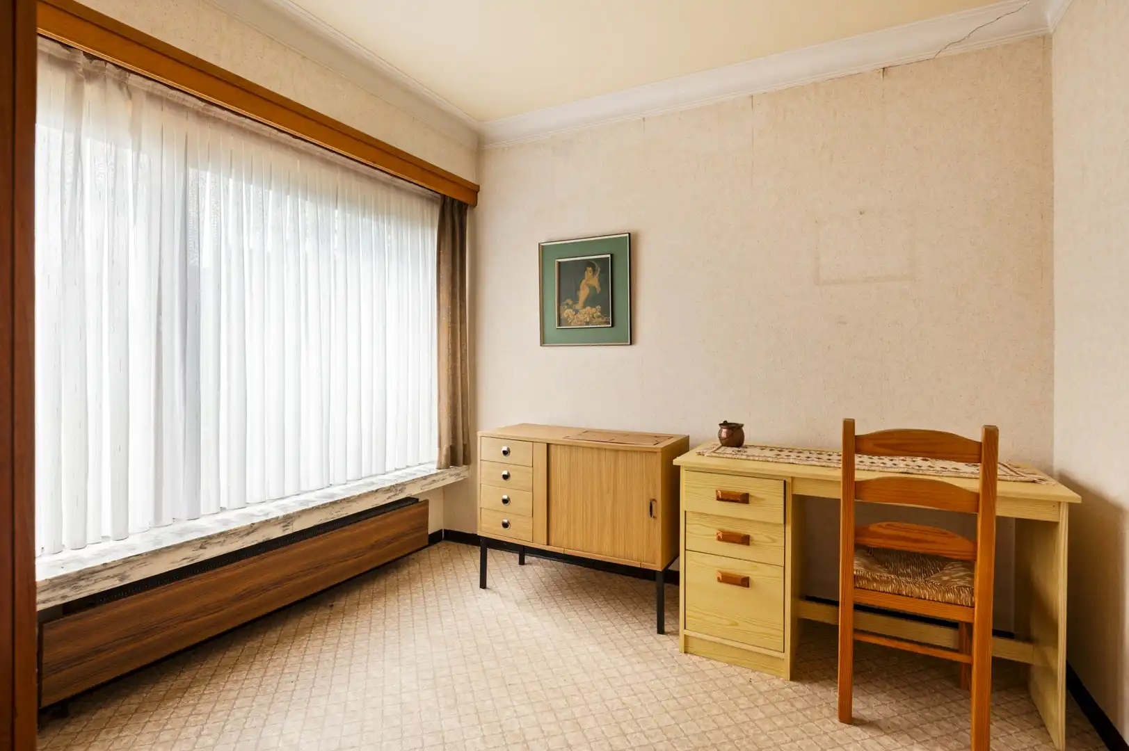 Gelijkvloerse woning met veel potentieel op een ruim perceel nabij het centrum van Herselt! foto 4