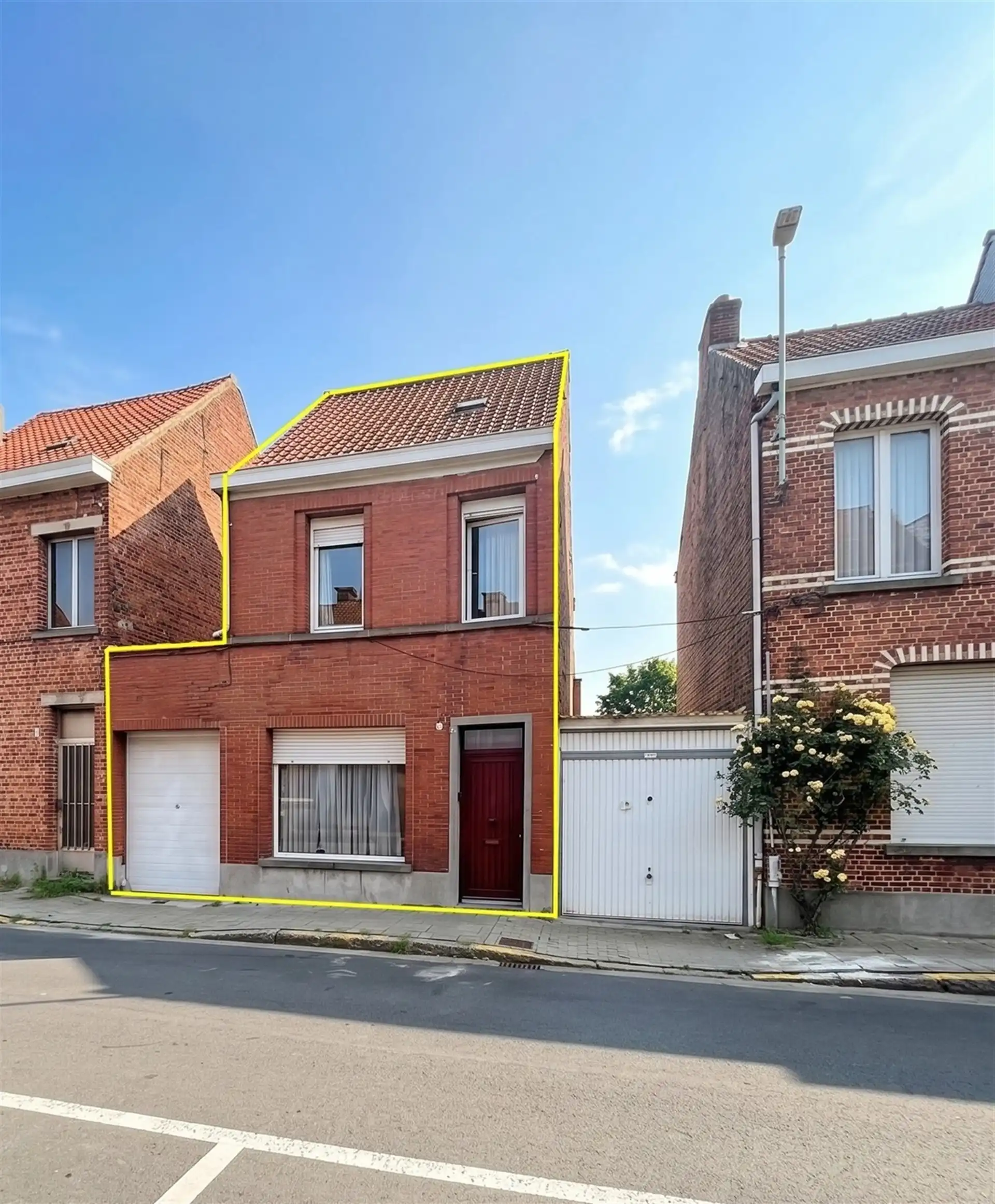 Ruime woning met veel potentieel, garage en tuin in het centrum van Beveren! foto 2