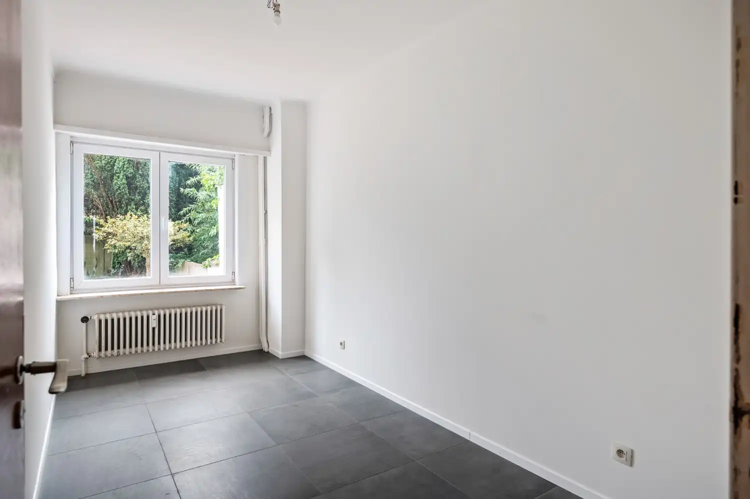 Ruim gelijkvloers appartement met 3 slaapkamers, tuin en garage! foto 6