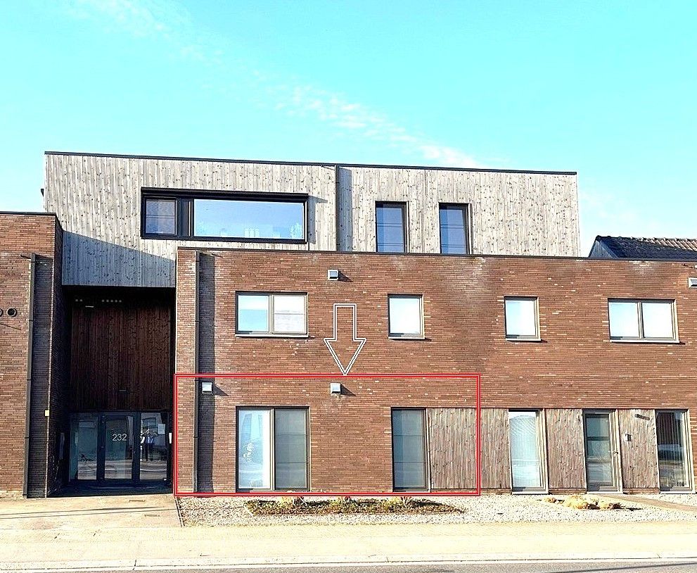 Modern gelijkvloers appartement met terras en tuintje in Opitter foto 3