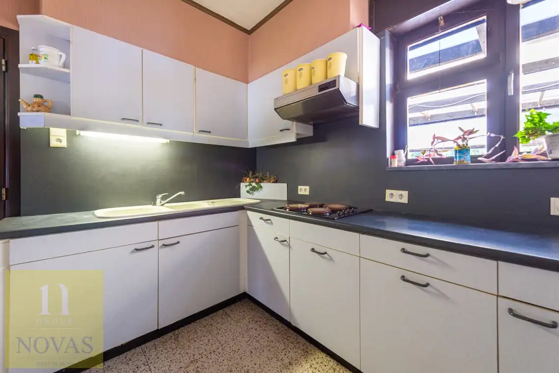 Landelijk gelegen woning op een perceel van 15 are, 23m straatbreedte foto 7