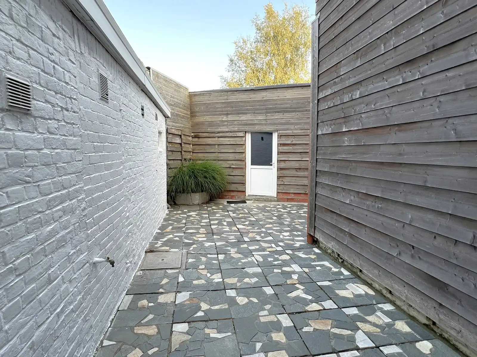 Verzorgde rijwoning met diepe tuin foto 9