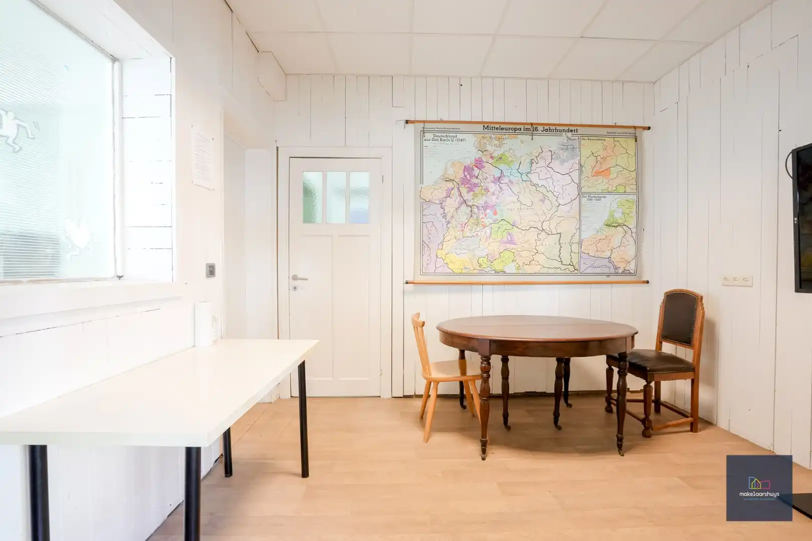 Karaktervolle eigendom met handelsruimte en renovatiepotentieel foto 11