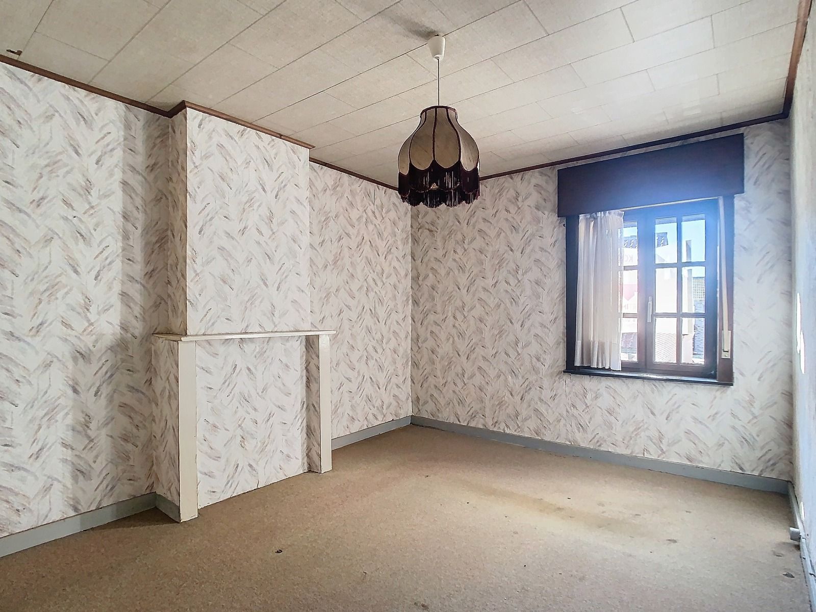 Zéér ruime, Te renoveren woning met 3 SLPK én garage! foto 12