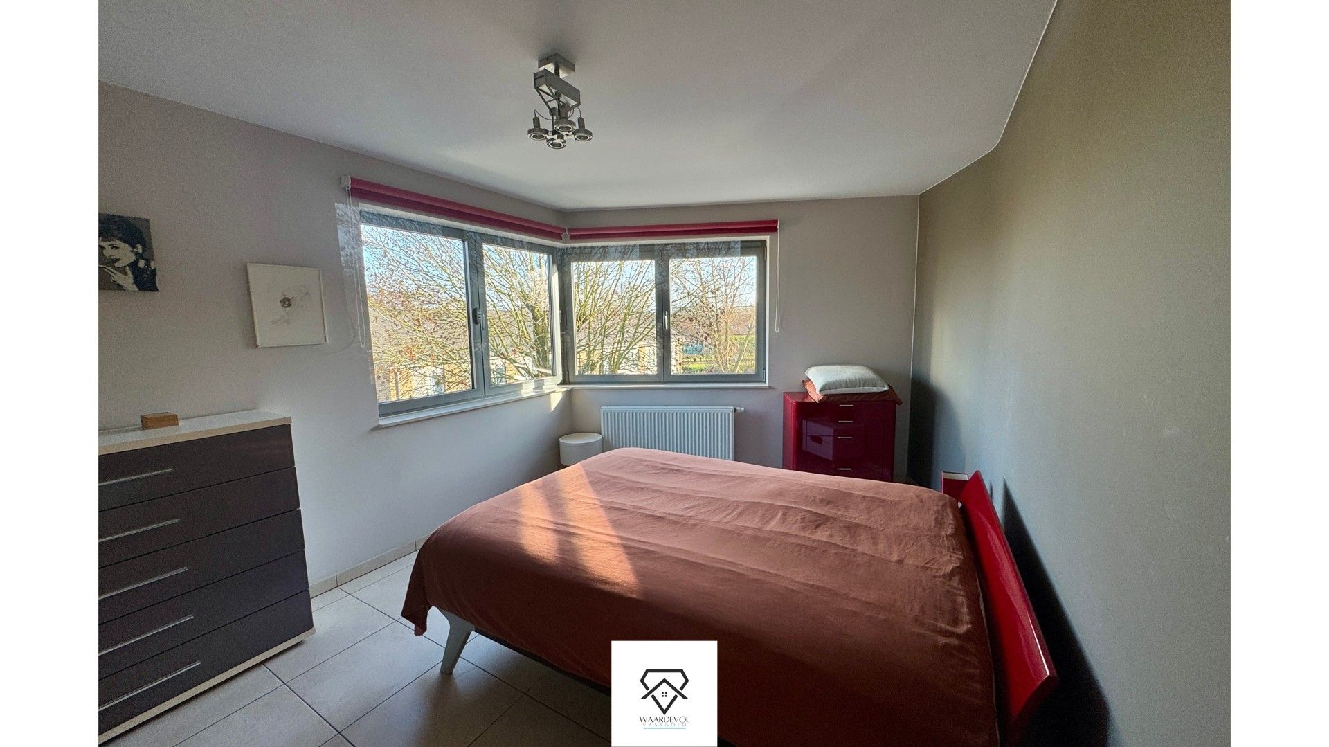 Lichtrijk en rustig appartement te koop met carport foto 10