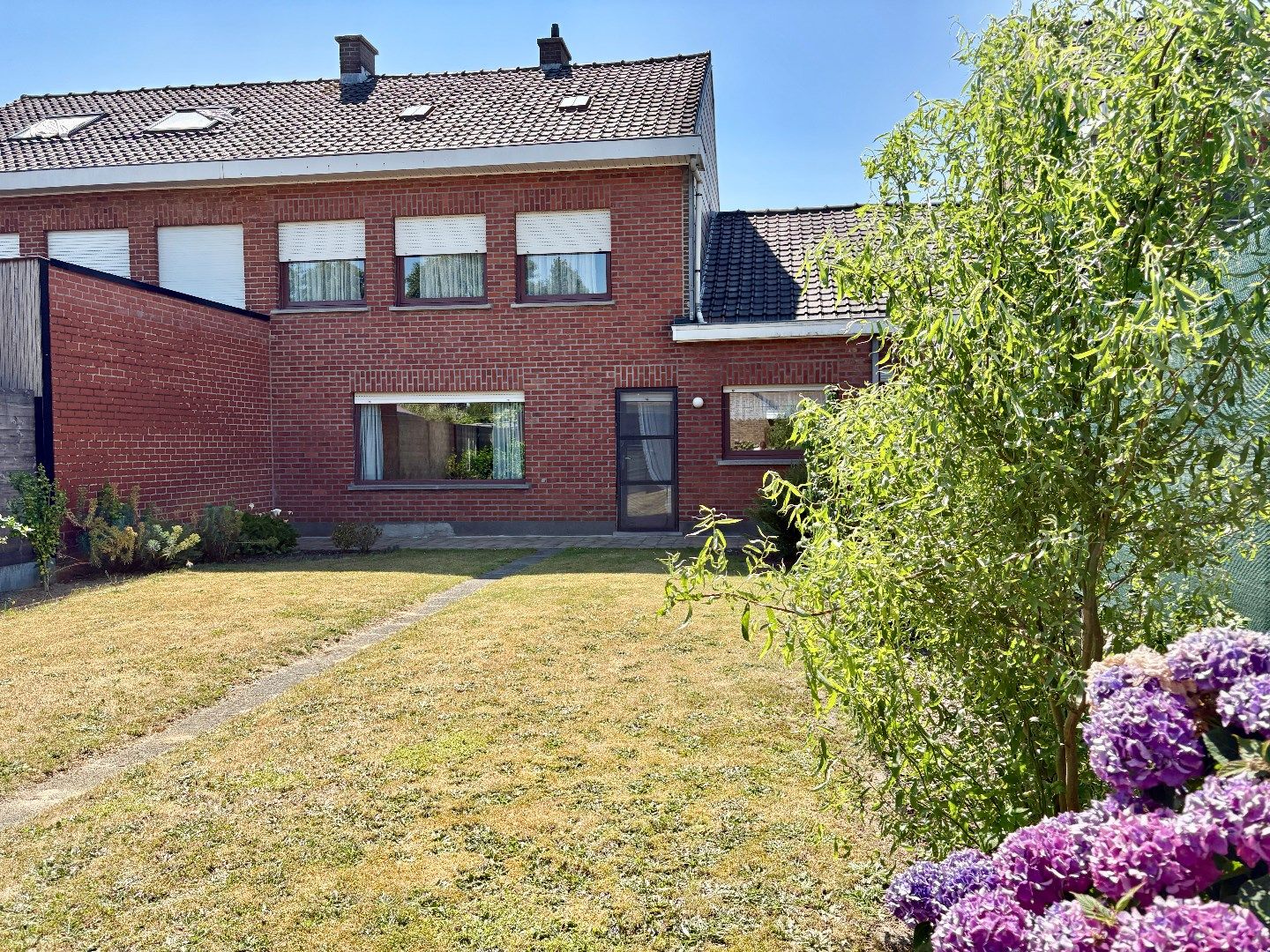 Stevige woning met 3 slpk op mooie locatie in Kuurne! foto {{pictureIndex}}
