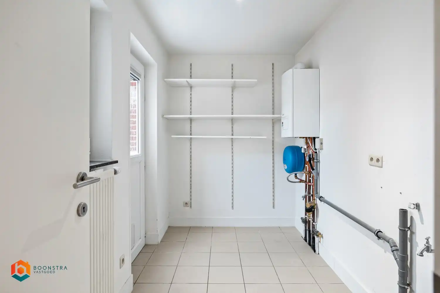 Instapklare rijwoning in centrum Heist foto 6