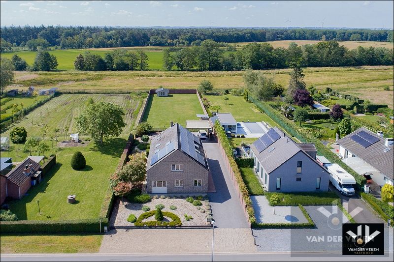 Rustig gelegen en zeer goed onderhouden zuid georiënteerde gezinswoning met kantoorruimte kort bij het domein van Bokrijk foto 1