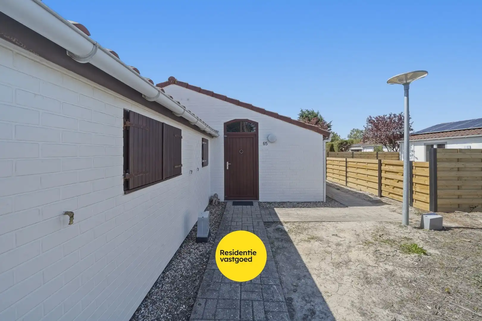 Instapklare vakantiewoning met zonnige tuin en 2 slaapkamers foto 15