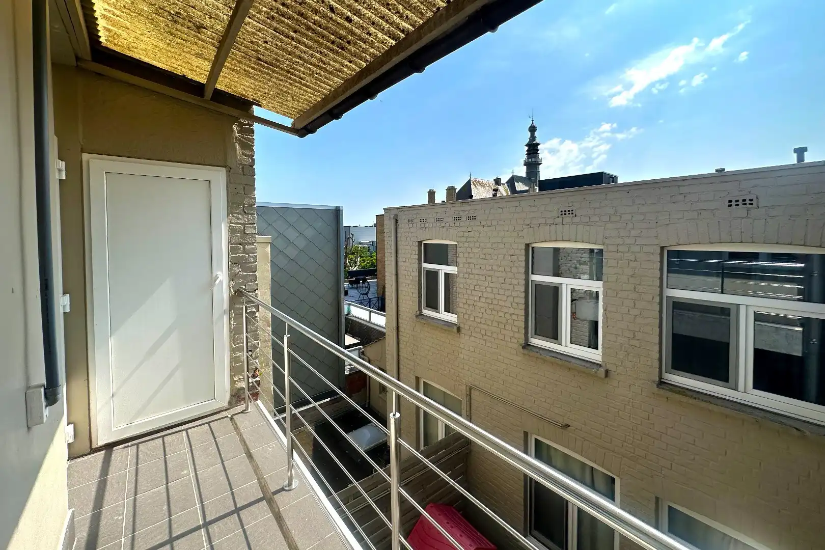 Prachtige interbellumwoning onderverdeeld in drie ruime appartementen foto 17