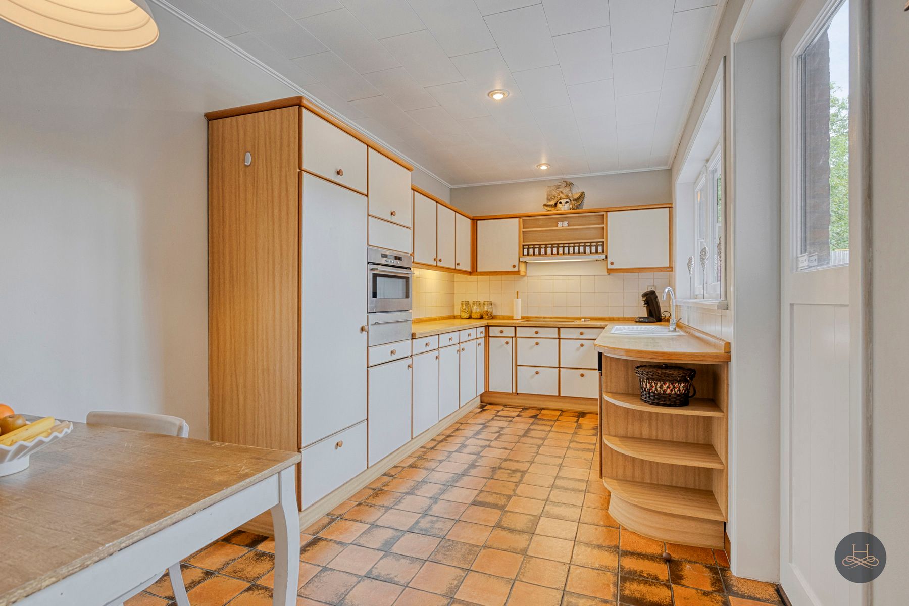 Gerenoveerde, unieke grote woning met ingerichte tuin foto 10