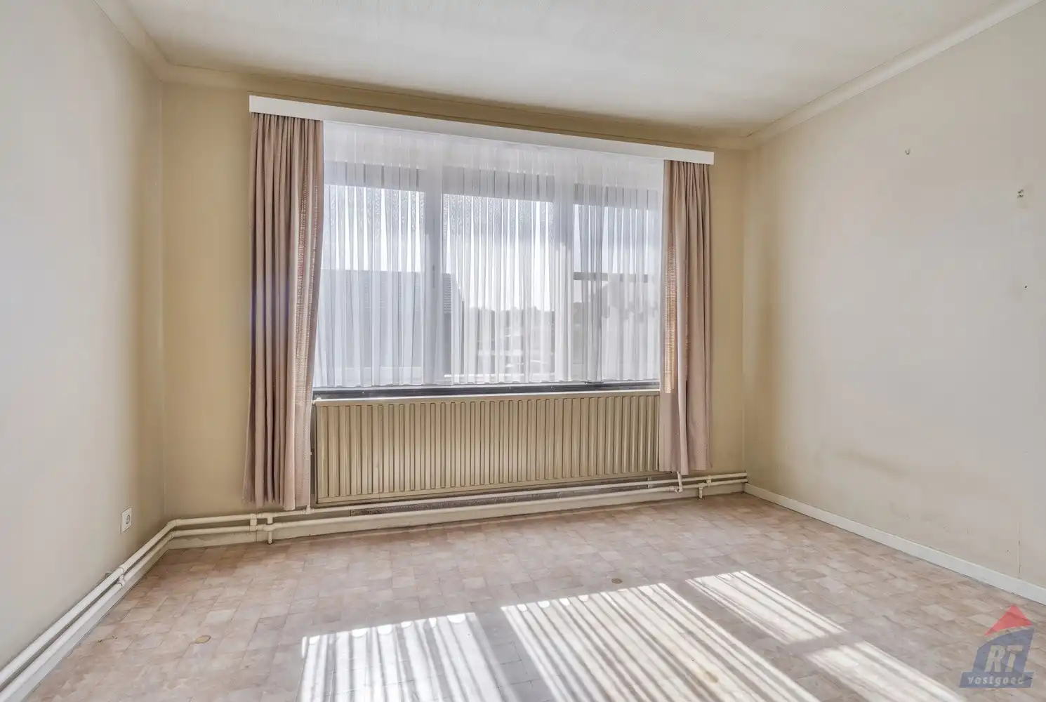 Rustig gelegen, op te frissen woning in Alken foto 12