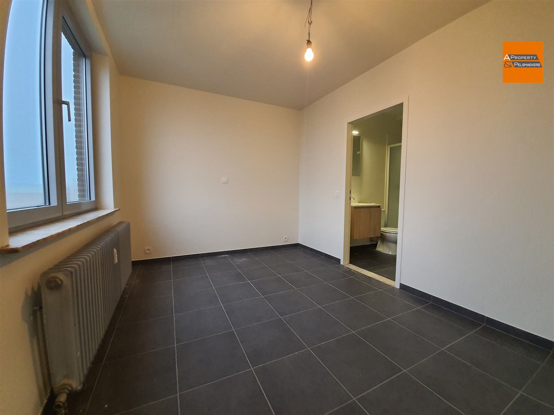 Gerenoveerd appartement met 1 slaapkamer te huur in Herent foto 9