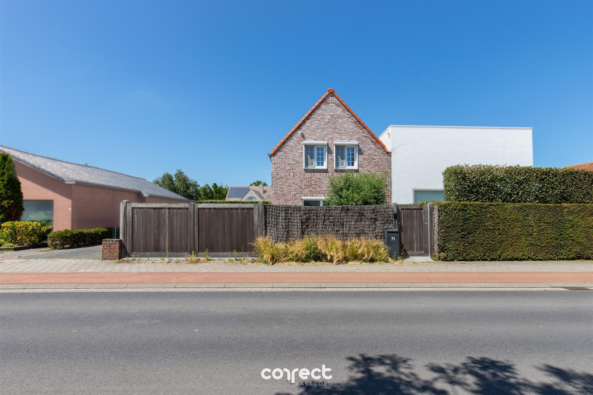 Modern halfopen woning te koop in hartje Oostduinkerke met 3 slaapkamers en diepe tuin foto 30