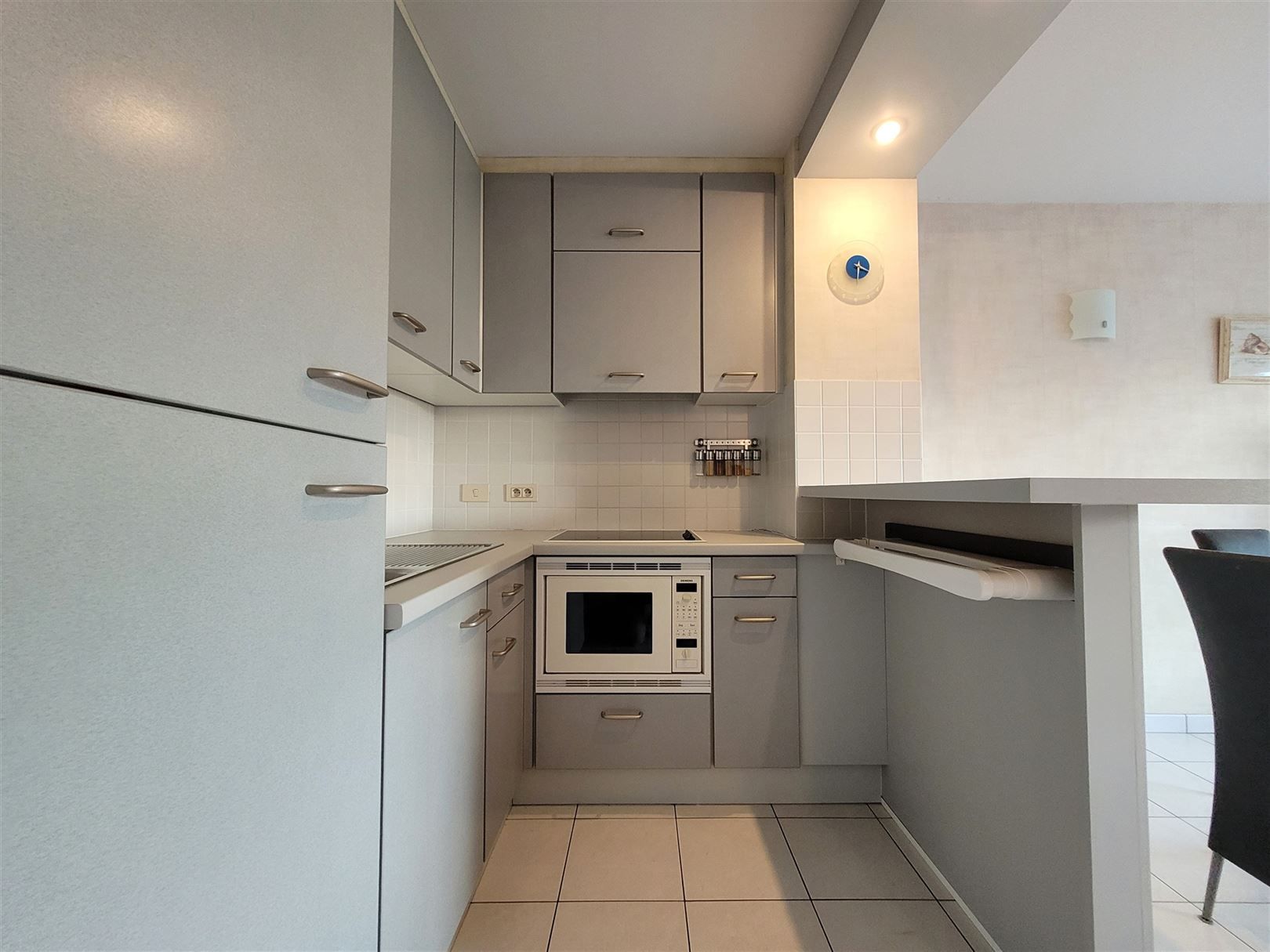 Gemeubeld appartement met 1 slaapkamer foto 12