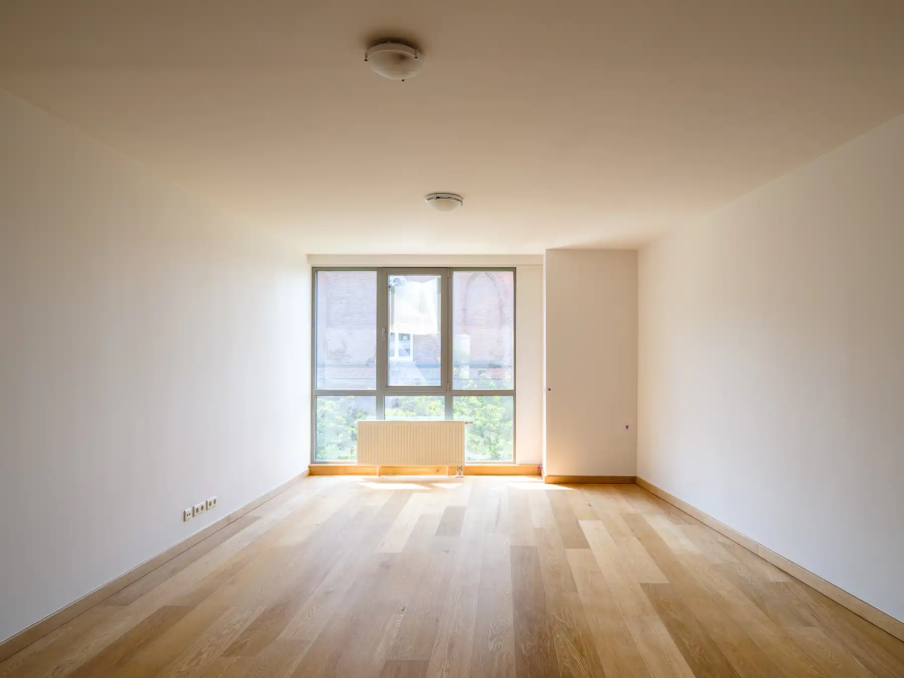 Lichtrijk appartement nabij de Coupure met ruime garageb foto 3