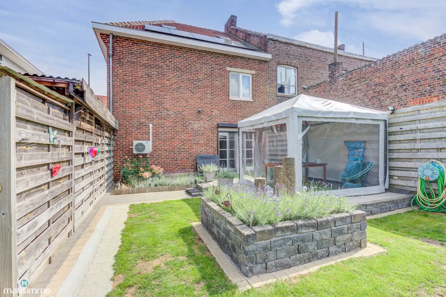KARAKTERVOLLE EENGEZINSWONING MET 5 SLAAPKAMERS, GARAGE, CARPORT EN TUIN NABIJ HET CENTRUM VAN BILZEN foto 33