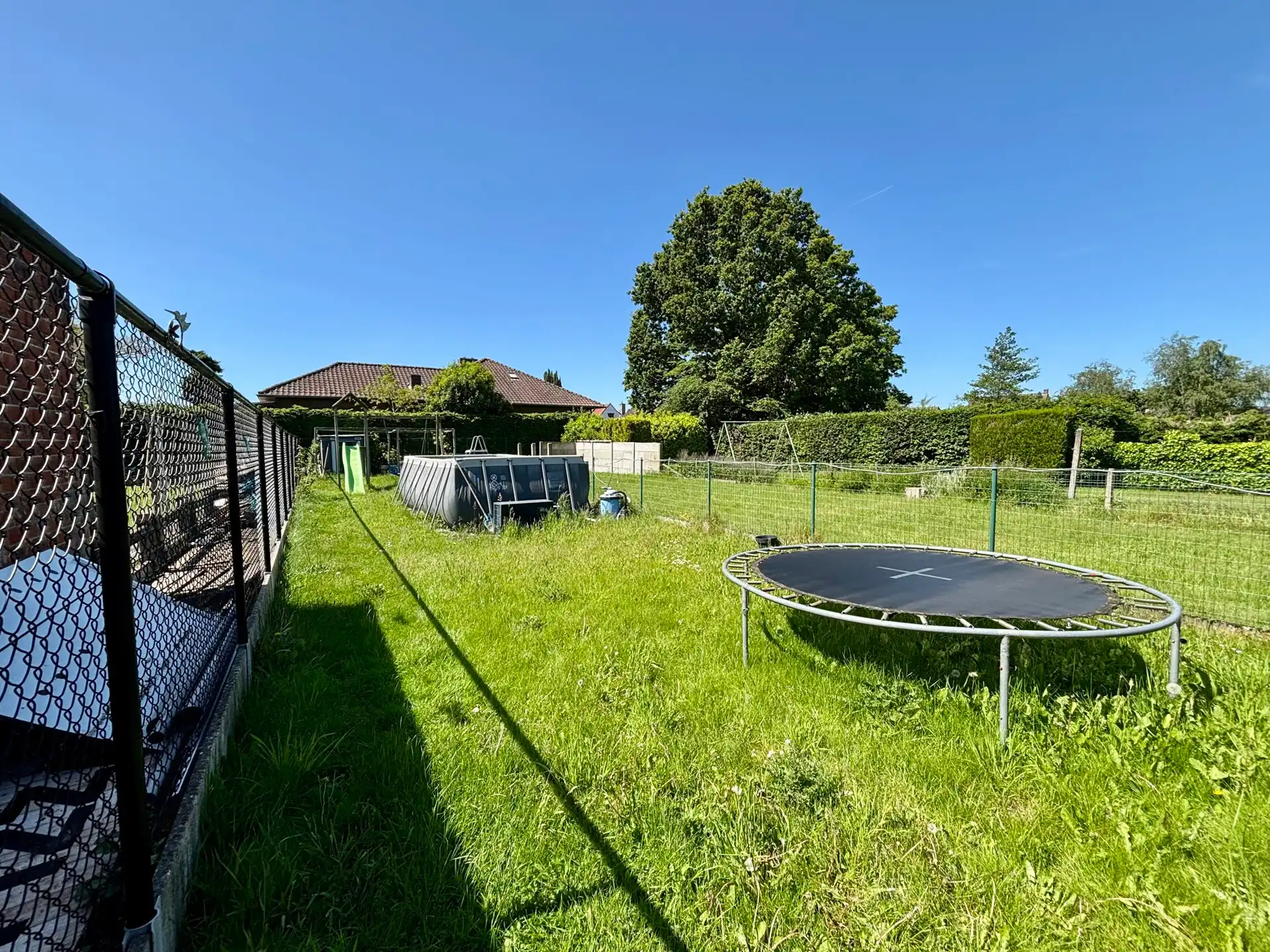 Instapklare halfopen bebouwing met 4 slaapkamers, garage en zonnige tuin foto 13