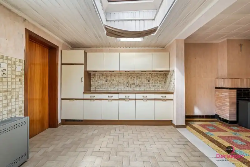 Te renoveren rijwoning op centrale ligging met leuke zuidgerichte tuin foto 8