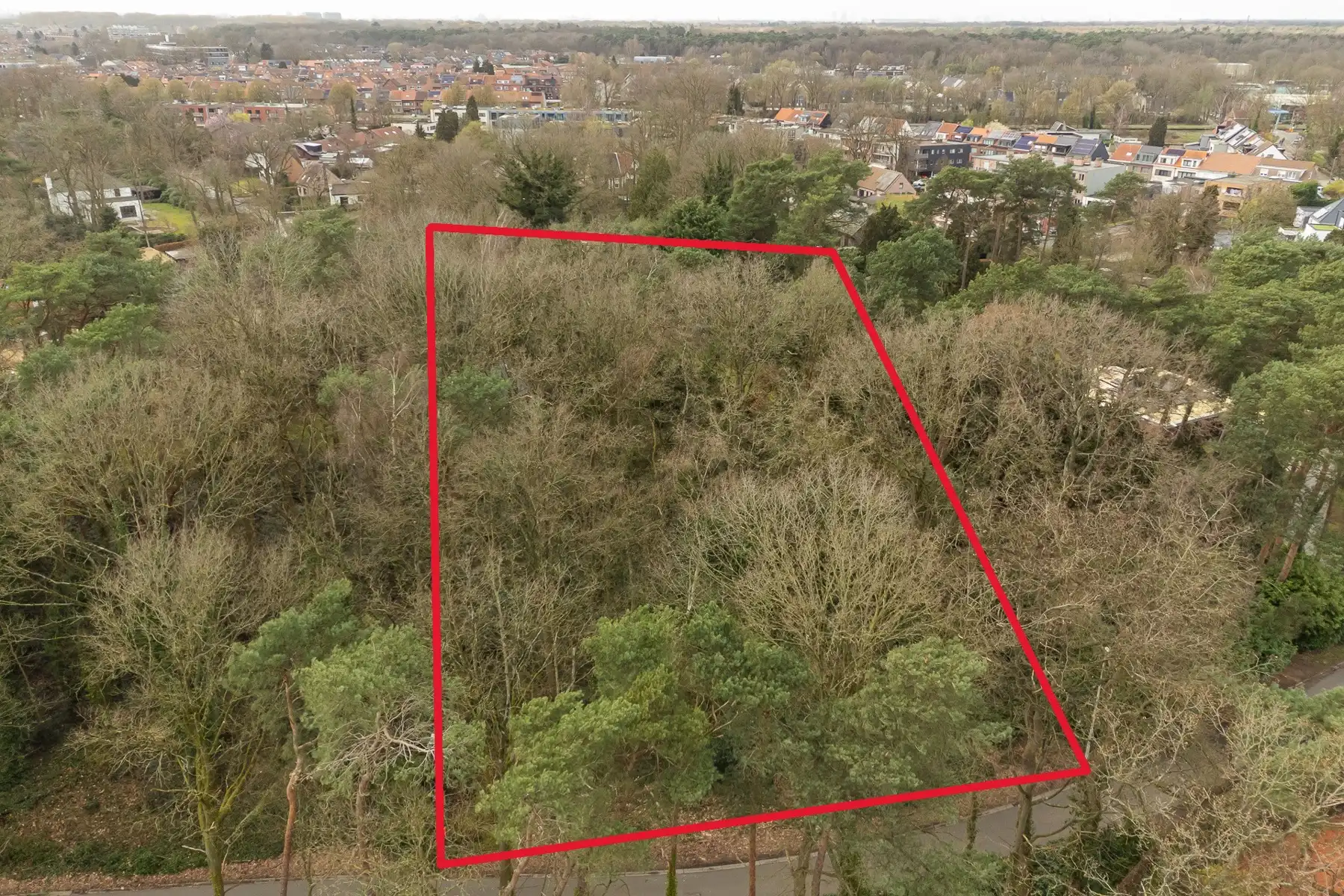 Bouwgrond van ca. 1566 m² gelegen in Koningshof te Schoten foto {{pictureIndex}}