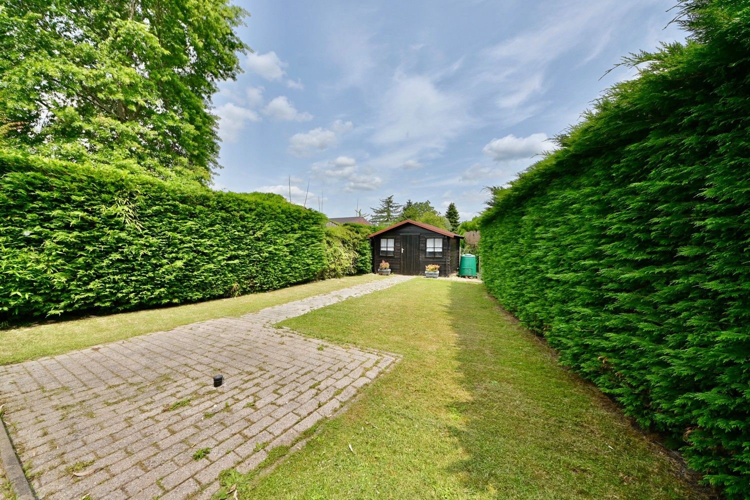Rustig gelegen laagbouw woning met 2 slaapkamers, garage en tuin. foto 20