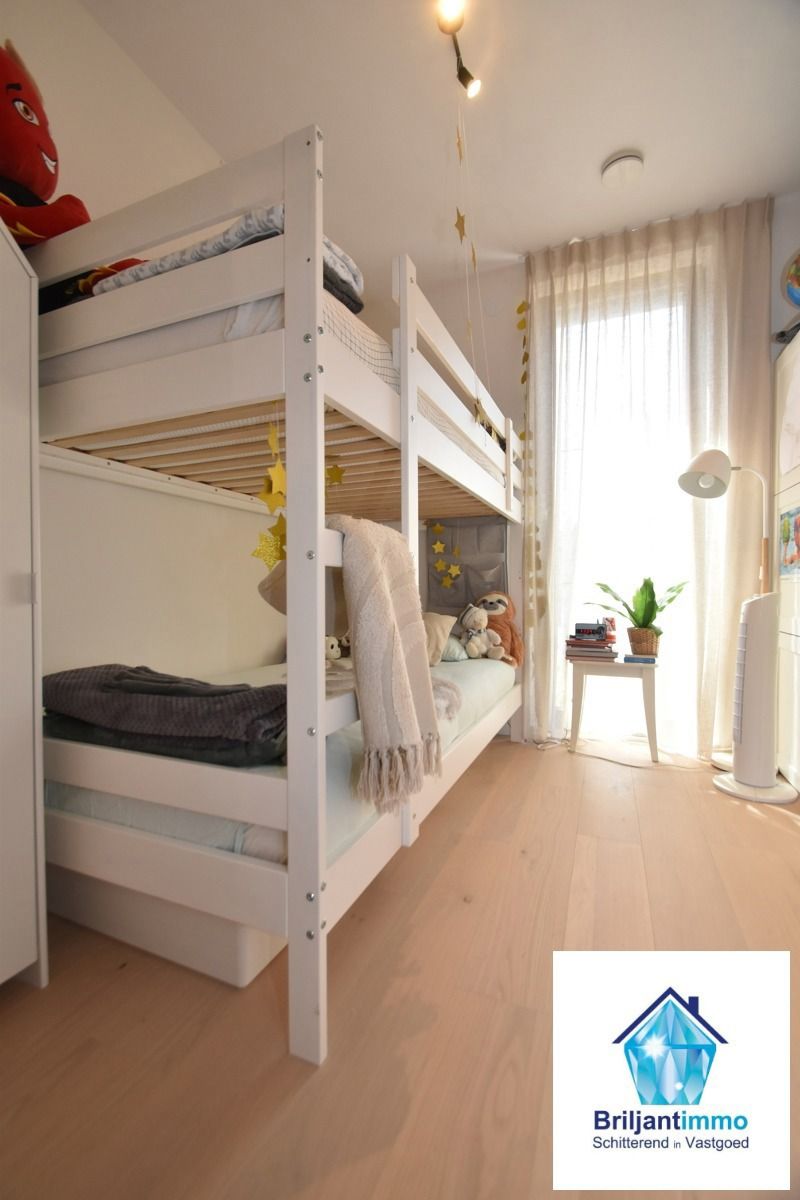 Energiezuinig gelijkvloers appartement met 3 slpkmrs & tuin foto 8