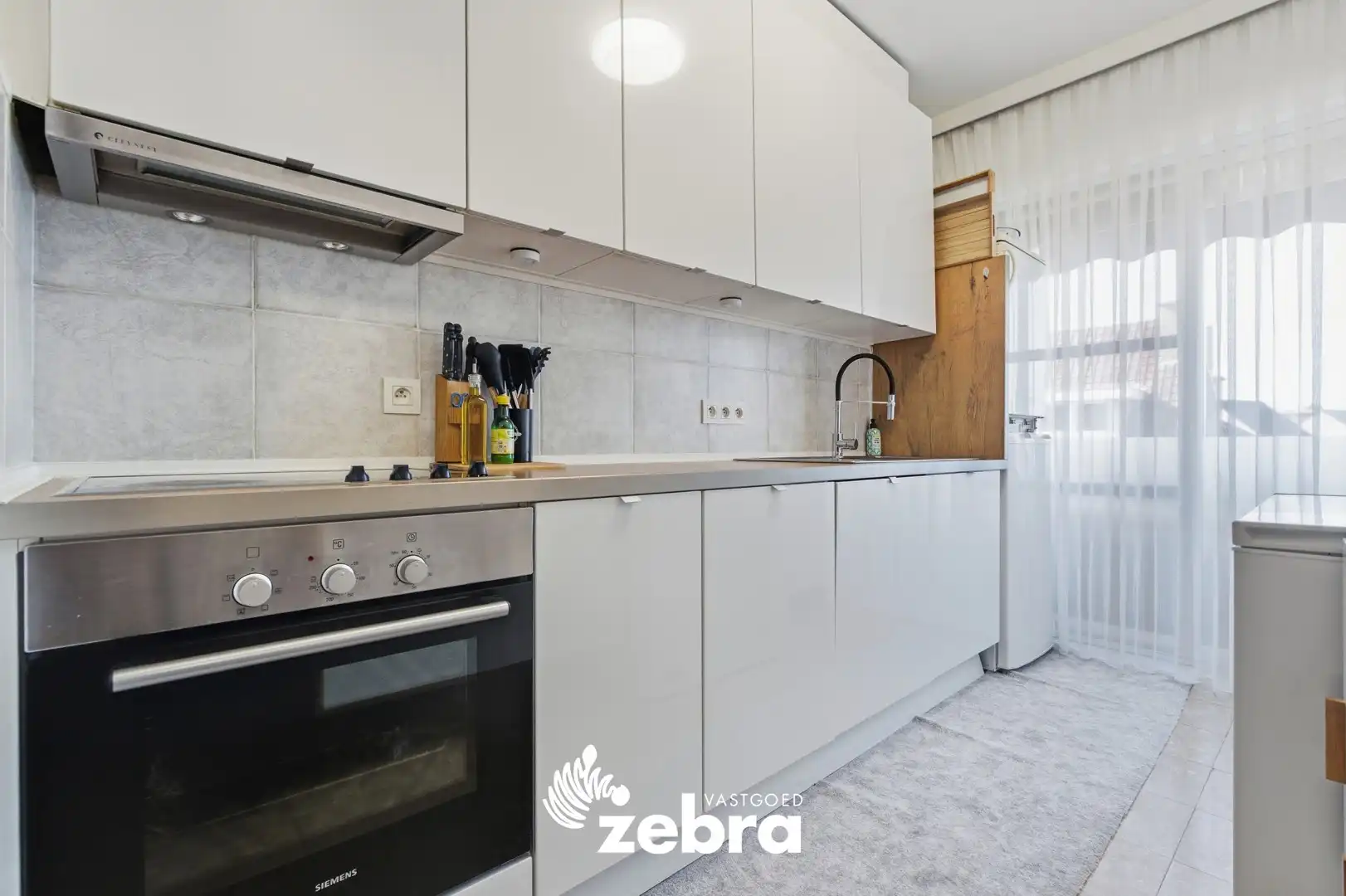 Gerenoveerd appartement met 2 slaapkamers in centrum Tielt! foto 6
